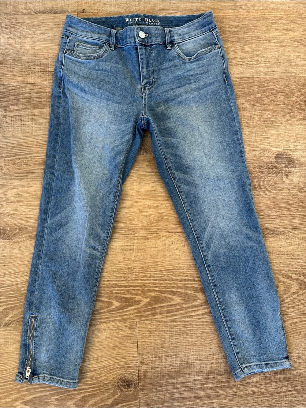 White House Black Market Light Wash Skinny Jeans with Ankle Zip
